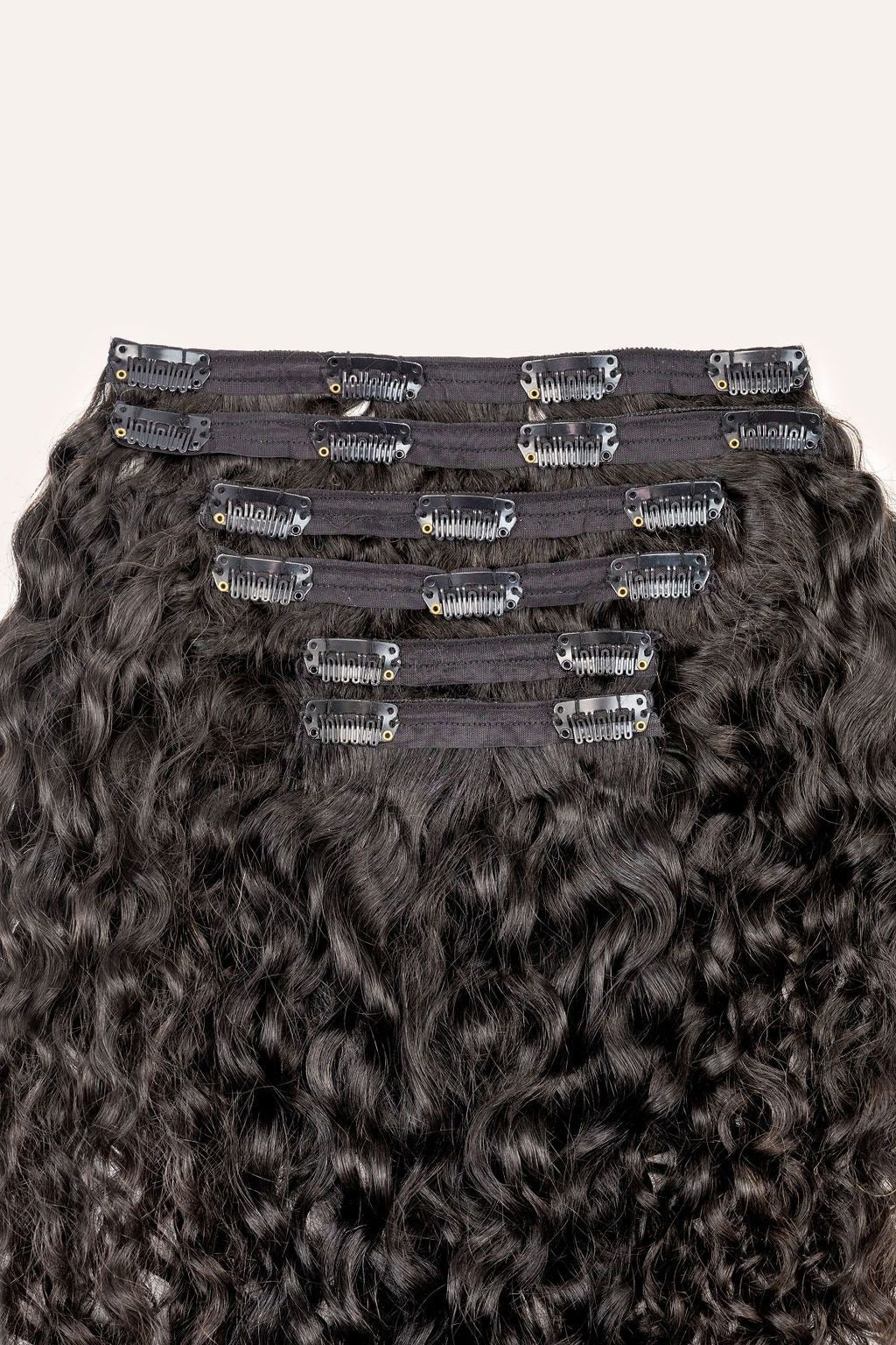 Curly clip in hair extensions